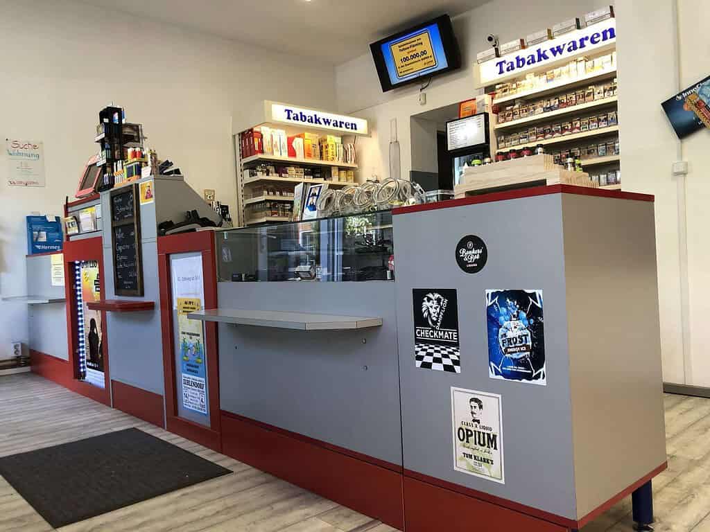 2. Hochwertige Tabakwaren im Onlineshop LETZ Go, vielfältige Auswahl an Zigaretten, Tabak, und Zubehör in modernem Laden.