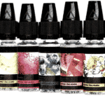 Aromen-Set mit fünf Fläschchen in verschiedenen Fruchtgeschmacksrichtungen, ideal für E-Zigaretten.