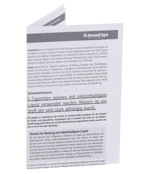 E-Liquid mit Nikotingehalt, Warnhinweis auf Suchtgefahr, für E-Zigaretten geeignet, in deutscher Anleitung, sicherheitsrelevante Hinweise, für verantwortungsvolle Nutzung, Produktetikett, Werbekategorie E-液体, Liquids.